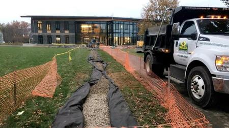 Omasta Landscaping Laying Drainage Ditch